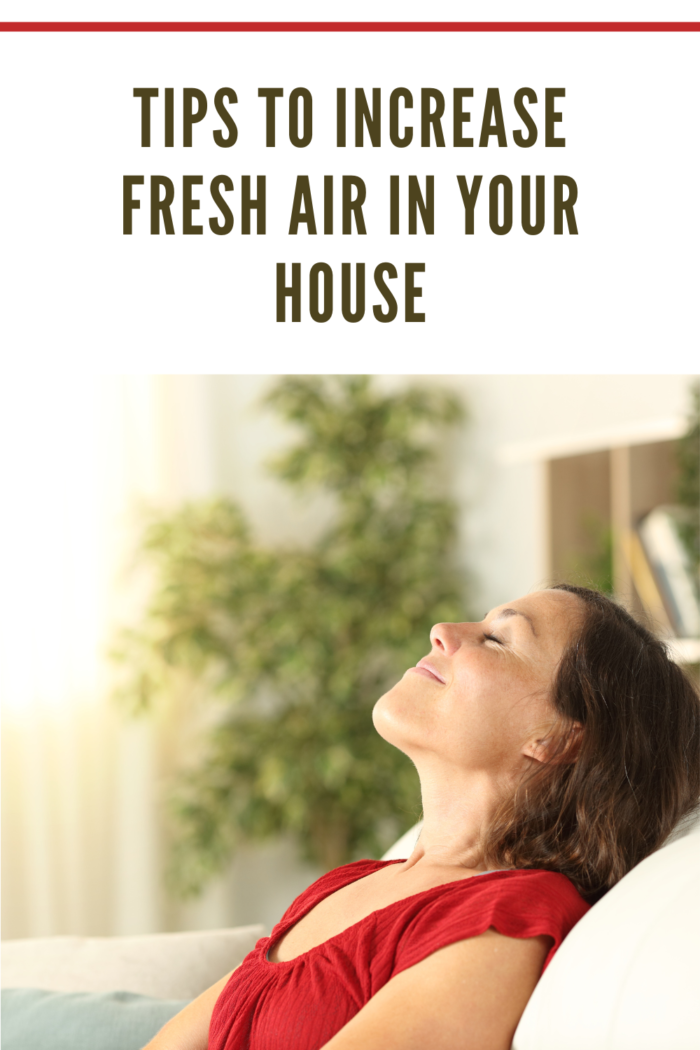 Adult woman breathing fresh air at home
