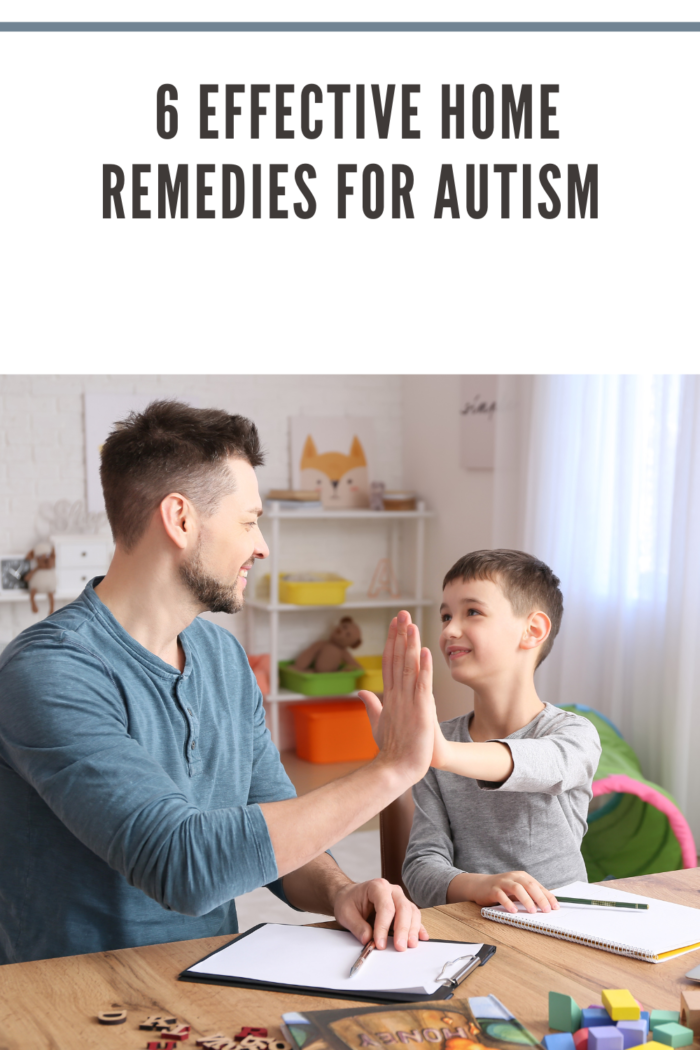 autism concept of male psychologist working with boy with autism