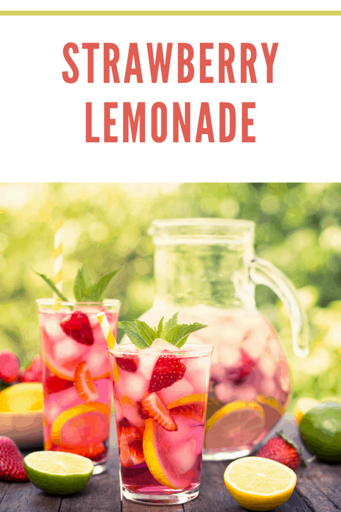 Two glasses of strawberry lemonade with a pitcher behind, ideal for summer refreshment