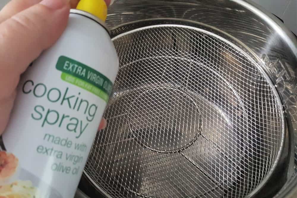 spray the basket with non-stick cooking spray
