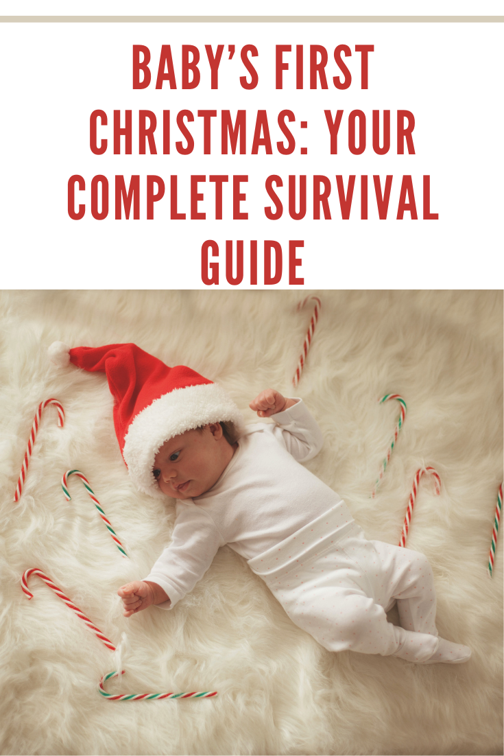 baby on white rug with santa hat