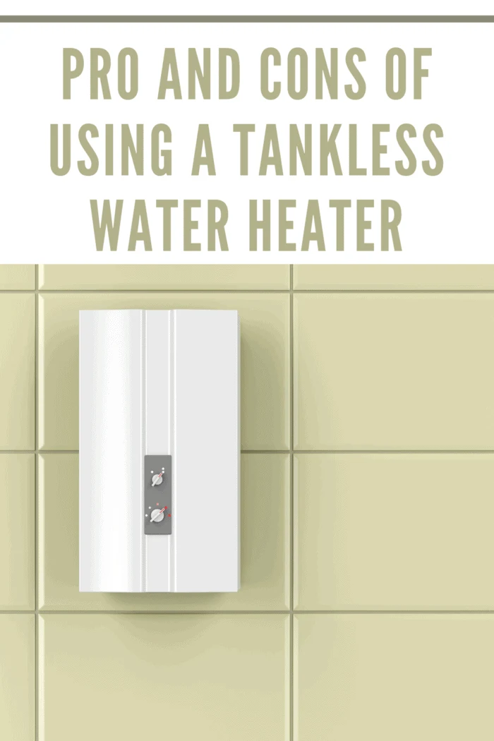 tankless water heater on yellow tiled wall