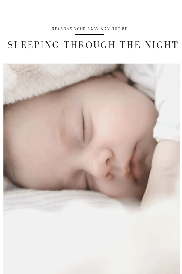 newborn wrapped in beige blankets sleeping through the night