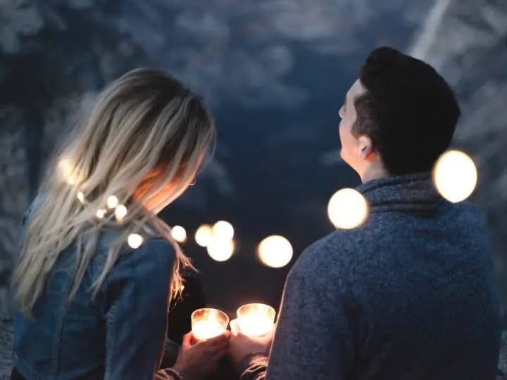 couple enjoying time together with lights