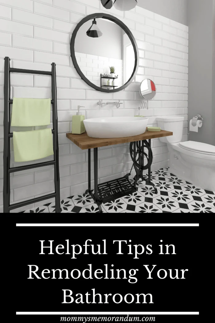 black and white bathroom with sink on old sewing machine stand