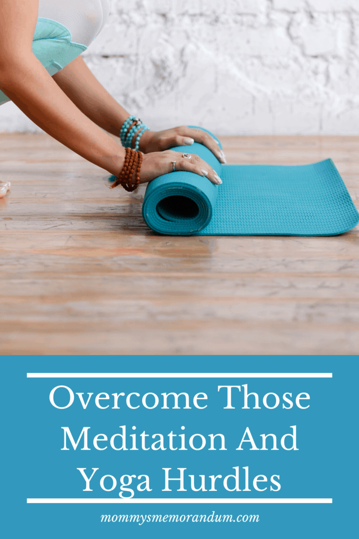rolling up the yoga mat after overcoming obstacles and finding zen