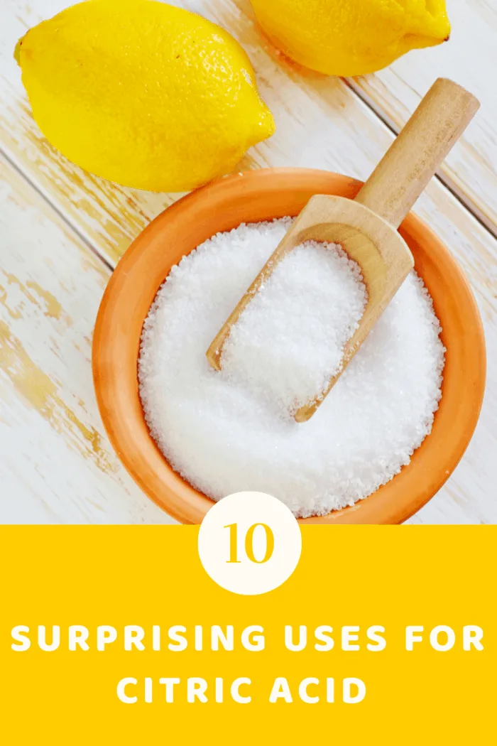 Bowl filled with citric acid and a scoop, showcasing a versatile ingredient for home and DIY projects.