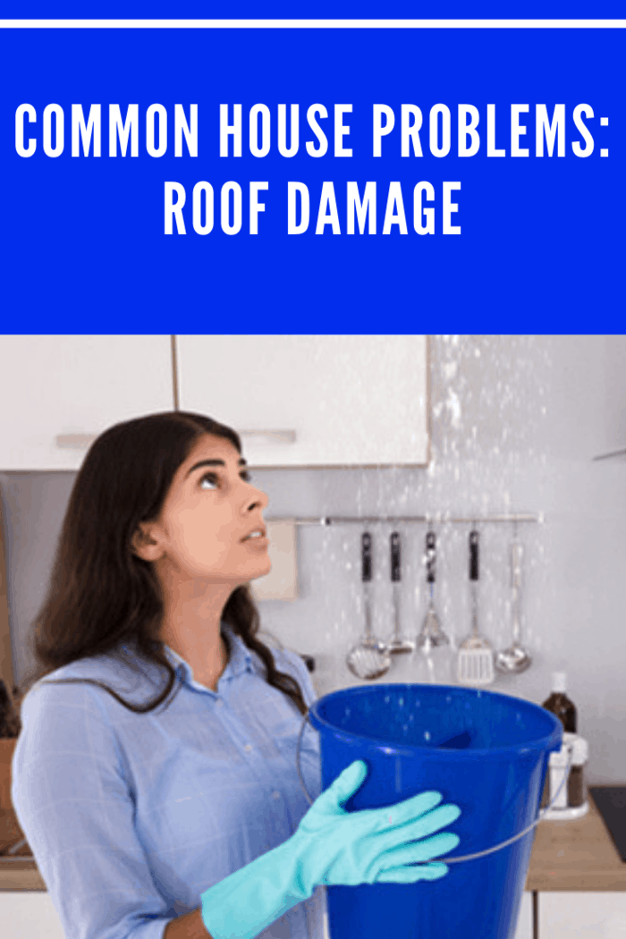 mom holding bucket under water leak coming from ceiling