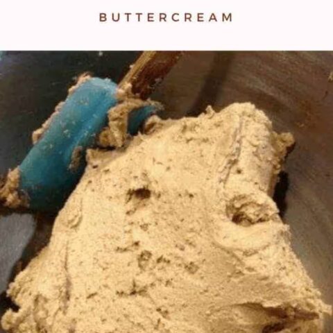 Root beer buttercream frosting in a mixing bowl, perfectly whipped and ready for cupcakes