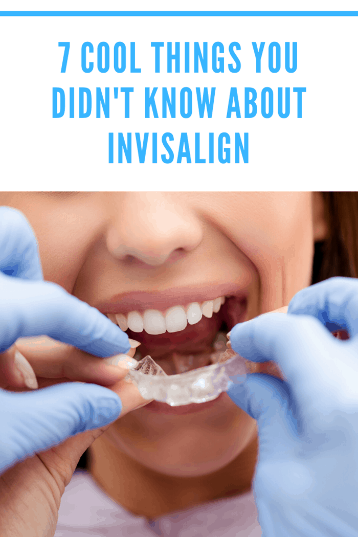 Orthodontist putting Invisalign aligners in mouth, demonstrating clear orthodontic solution process