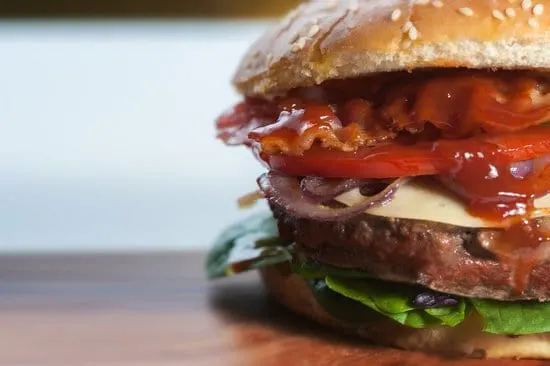burger with lettuce tomato and bacon