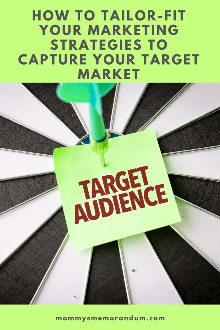 target with dart in bulls eye holding "target audience" post it