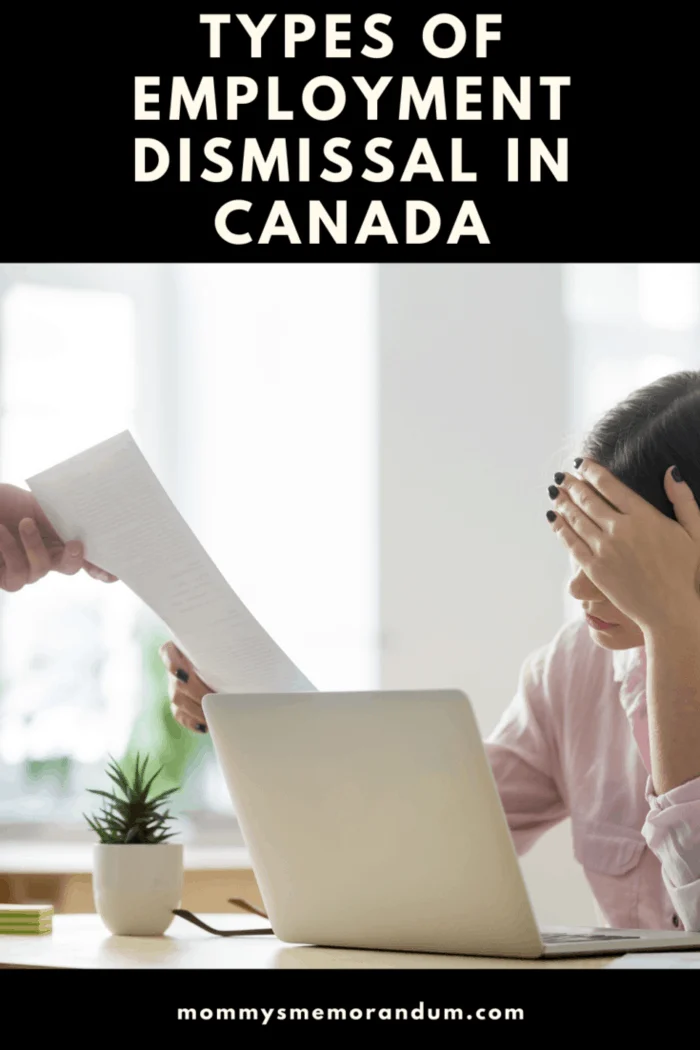 woman at desk being served termination papers