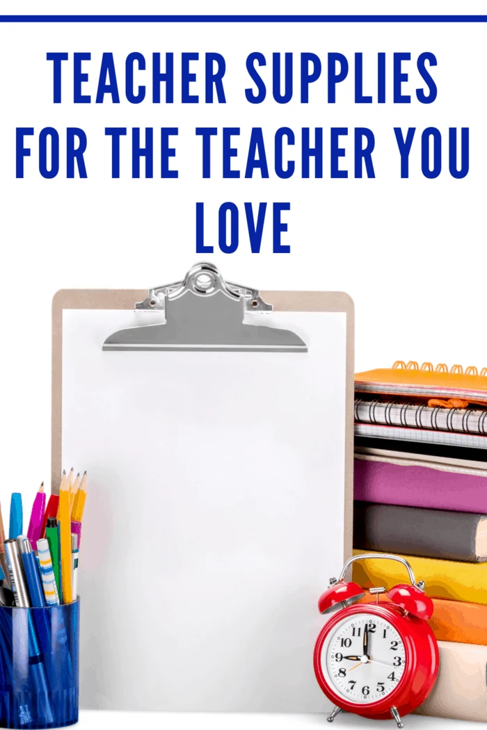 clipboard next to pens and stack of school books