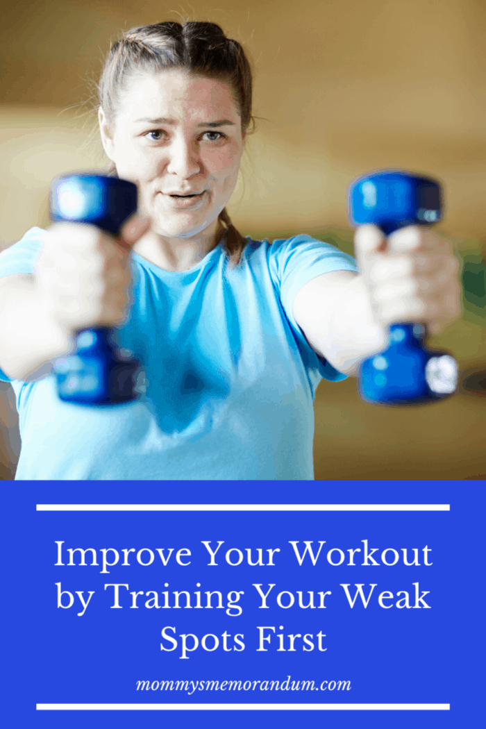 woman working out with hand weights to improve her workout