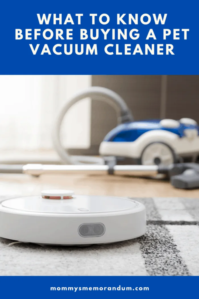 robot vacuum vacuuming with canister background in background