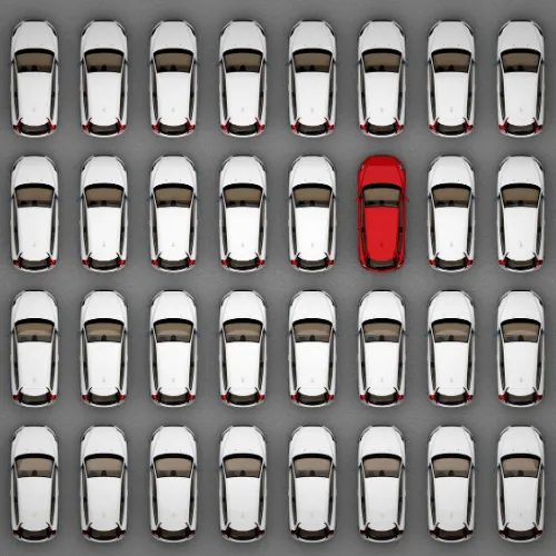 one red car among lots of white cars top view. 3d rendering