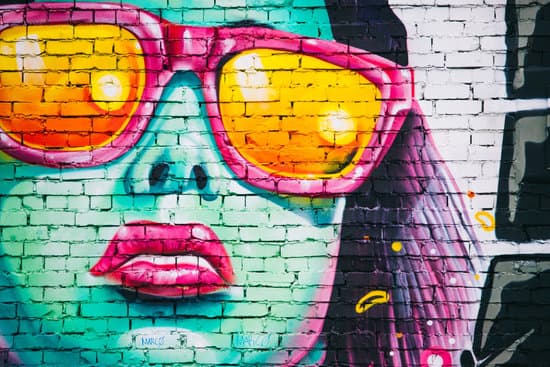 graffiti street art of woman with sunglasses