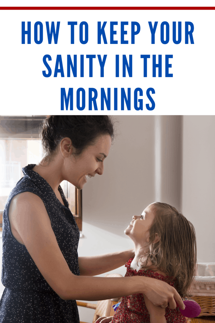 Woman combing the hair of little girl in the morning. Concept of family and happiness