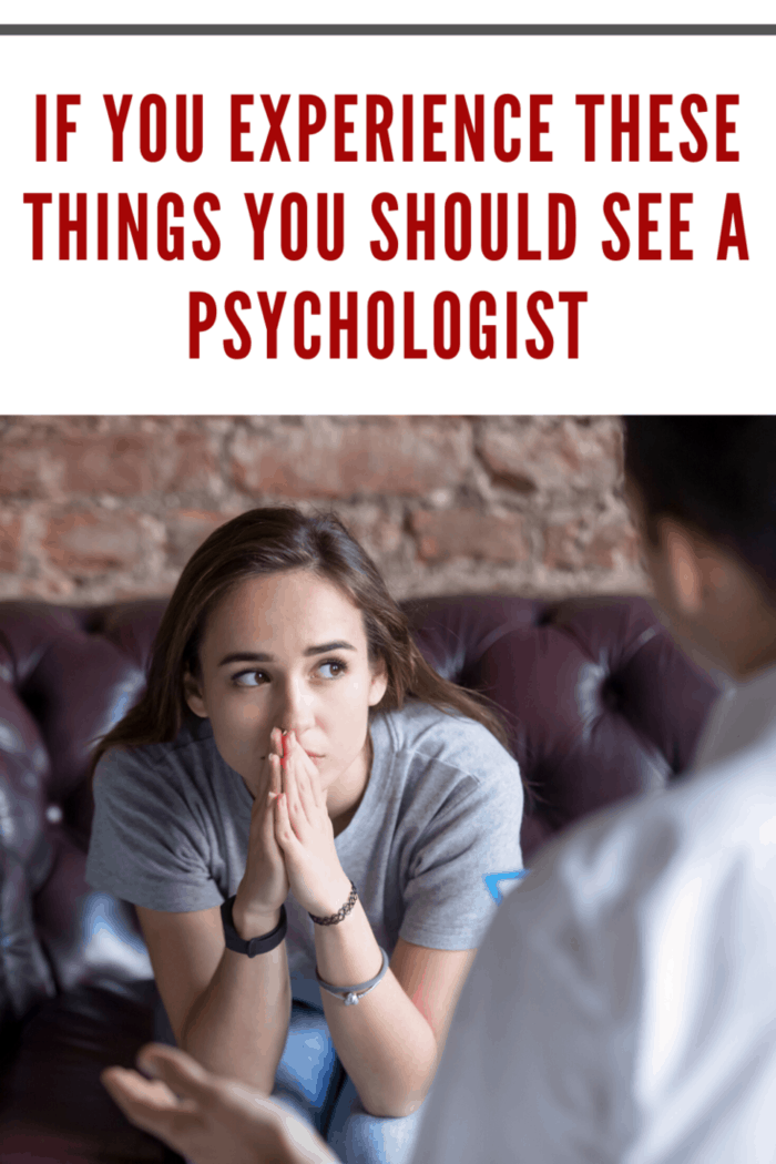woman sitting on couch after deciding to see a psychologist