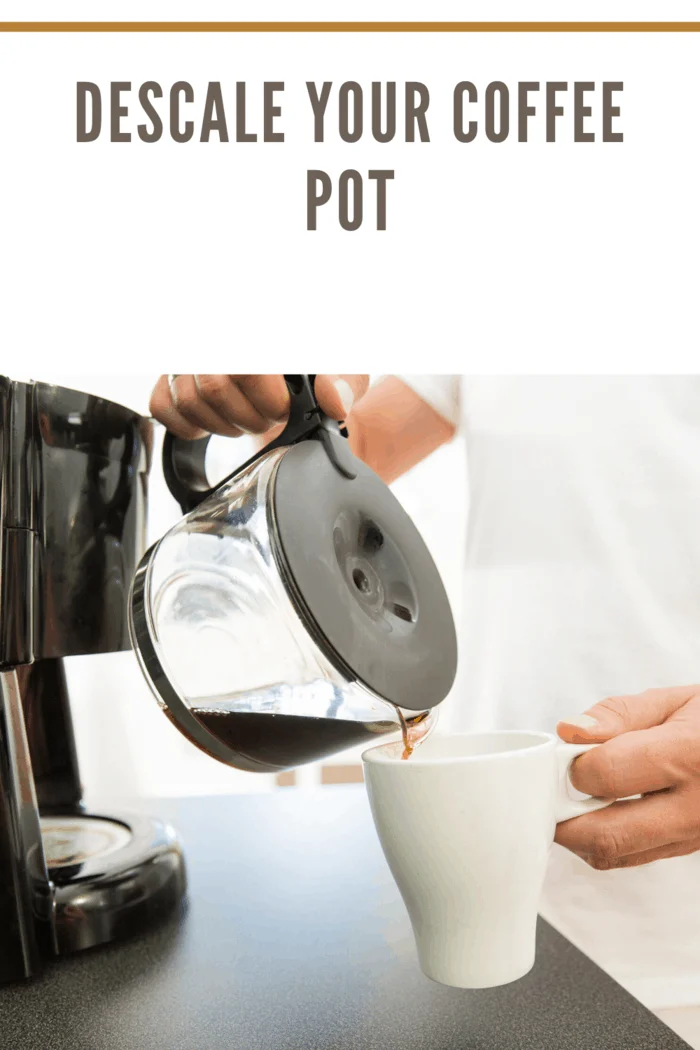 coffee pot pouring into cup