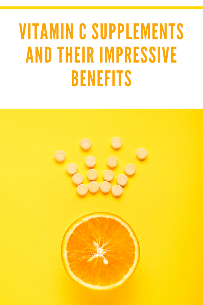 vitamin c supplements forming a crown over an orange slice