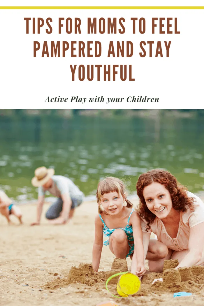 mom active playing with children on beach