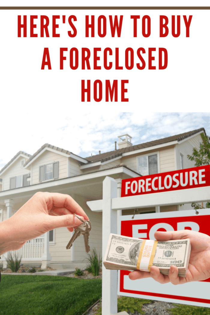 cash and keys in front of foreclosed home with sign