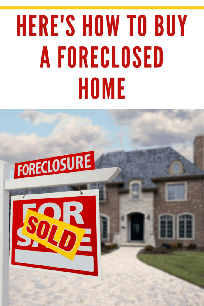 foreclosed home with sold sign