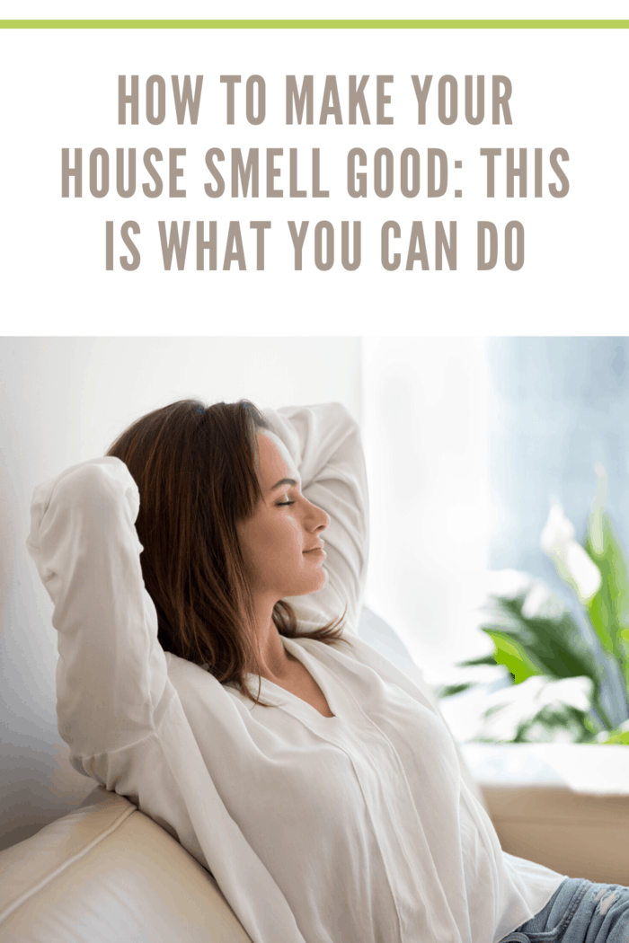 woman relaxing and enjoying that her home smell good