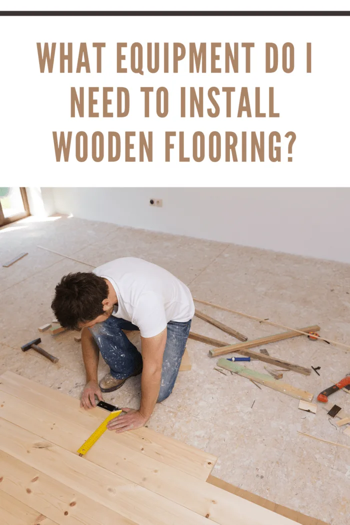 man with equipment for installing wooden flooring