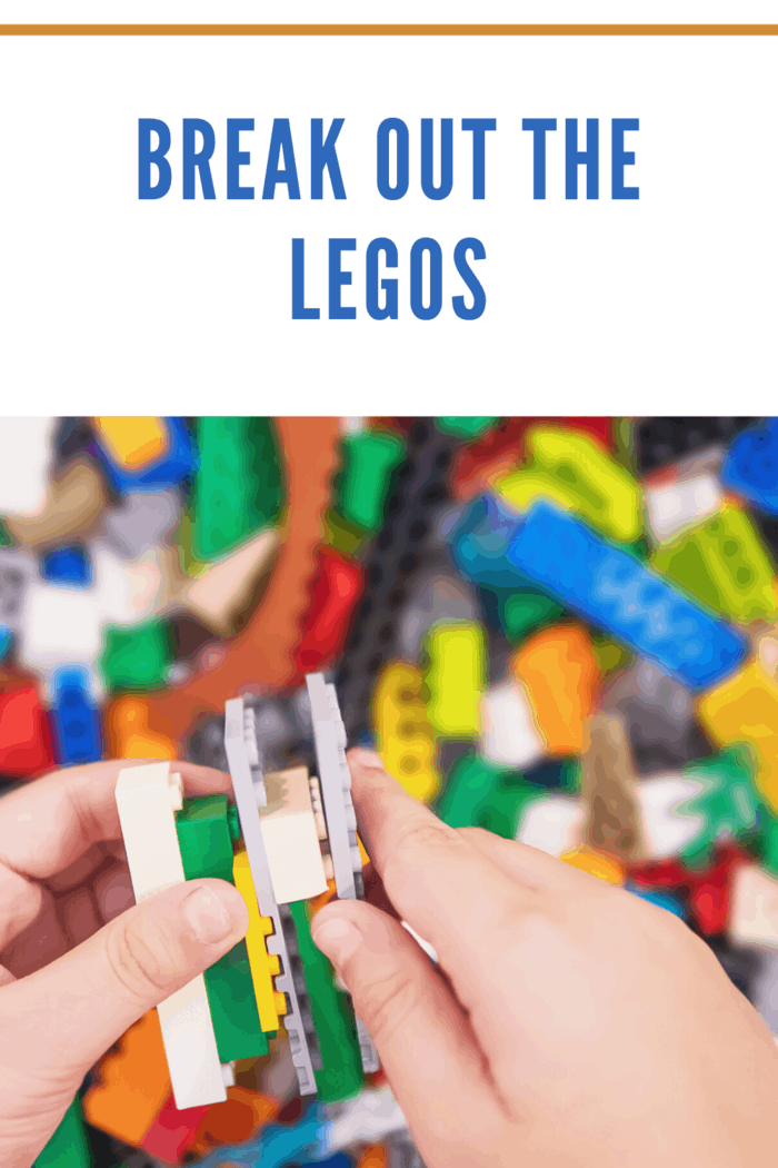 child connecting LEGOS