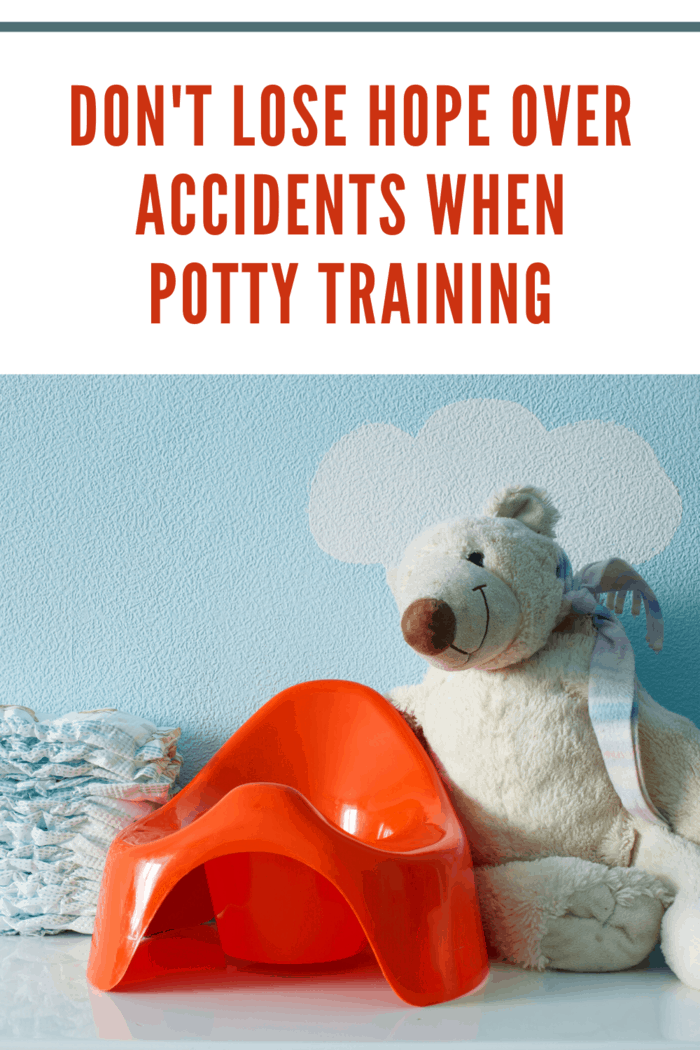 potty training seat, diapers and stuffed bear toilet training for children with autism