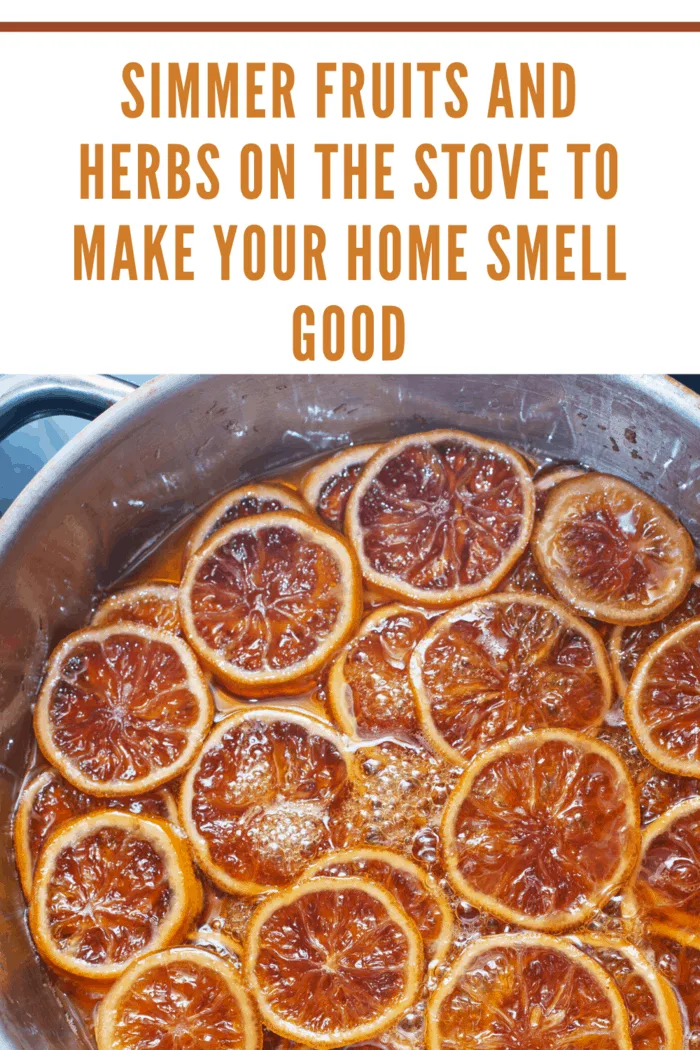 sliced oranges simmering on stove