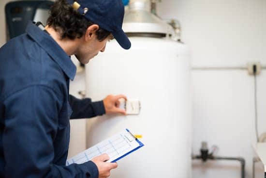 water heater inspector checking water heater