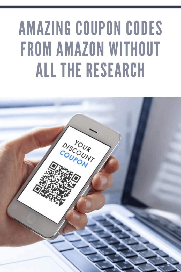 hand holding mobile device with qr code for amazon coupon code