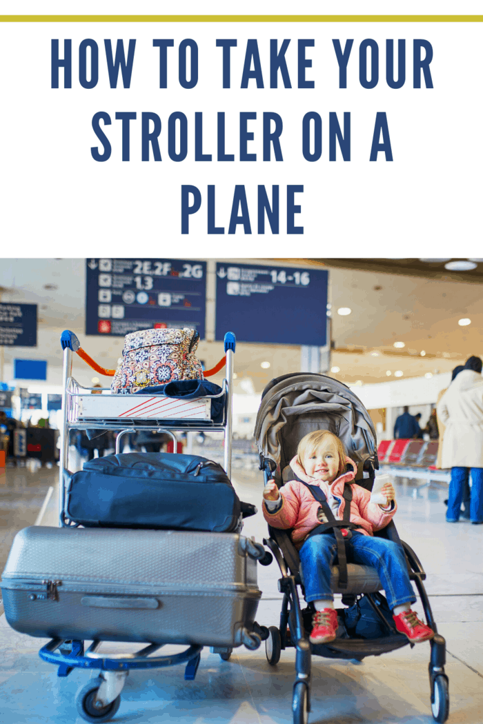 Adorable little toddler girl in international airport. Small child sitting in pushchair near heavy luggage. Traveling abroad with kids