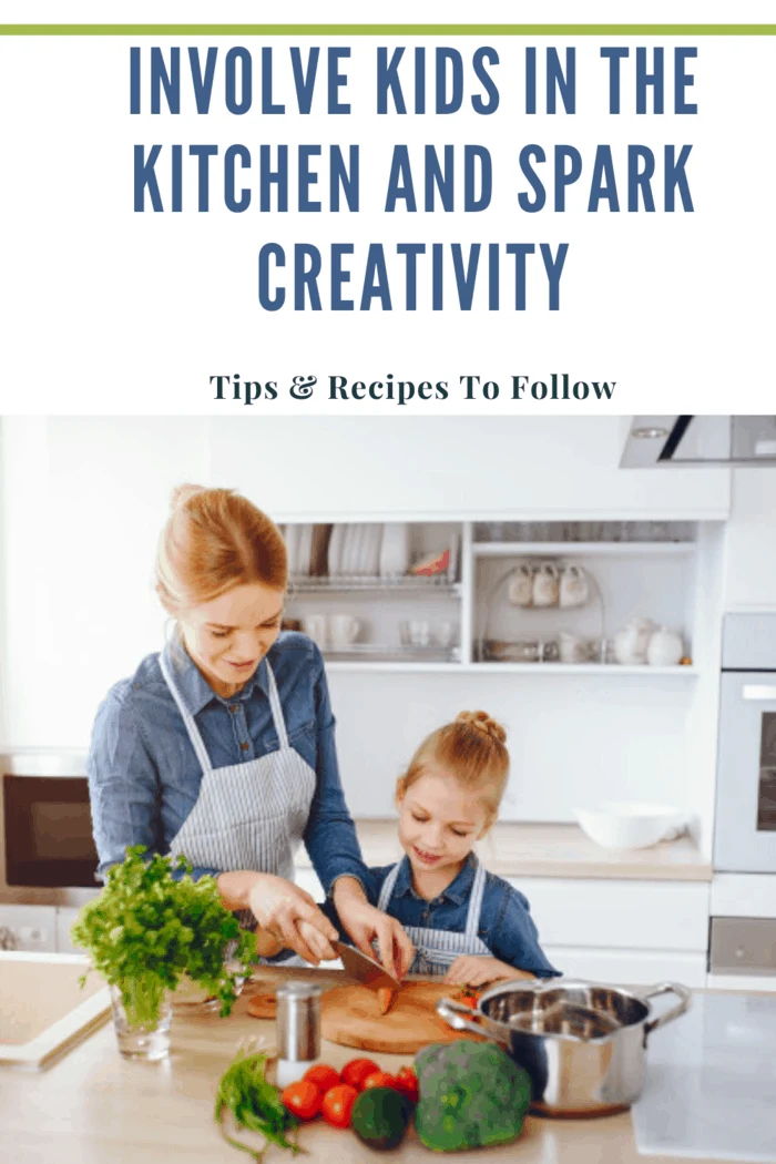 Beautiful mother in a blue shirt and apron is preparing a fresh vegetable salad at home