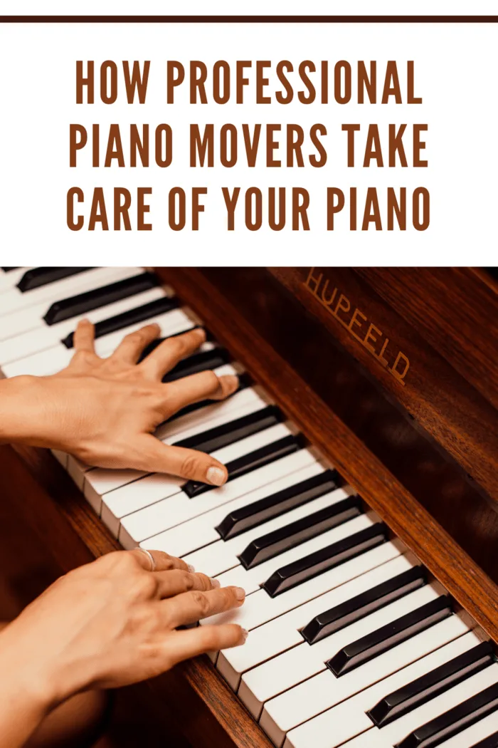 brown piano with hands playing piano keys