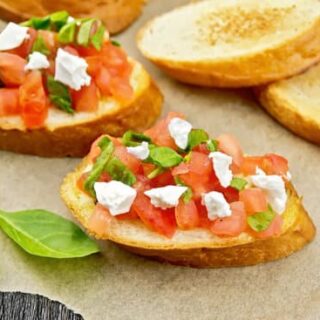 This fresh tomato bruschetta is simple--not just simple to make but filled with simple ingredients like tomatoes, onion, mozzarella cheese, and garlic.