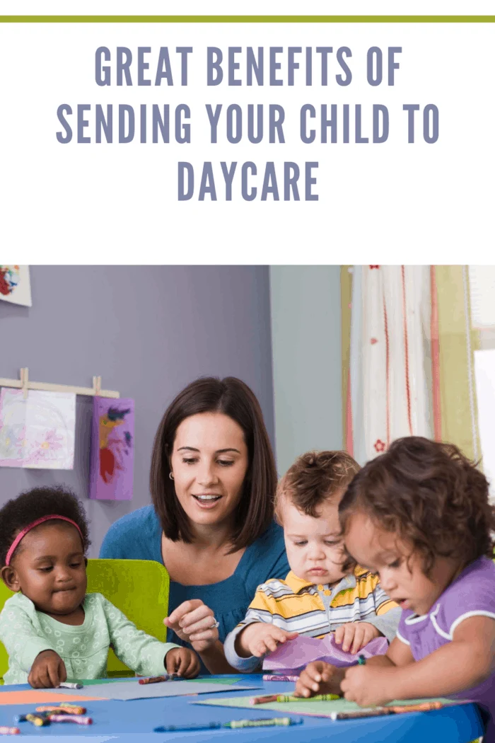 children at daycare doing project with daycare teacher