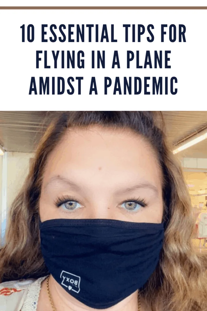 woman wearing a black face mask at the airport