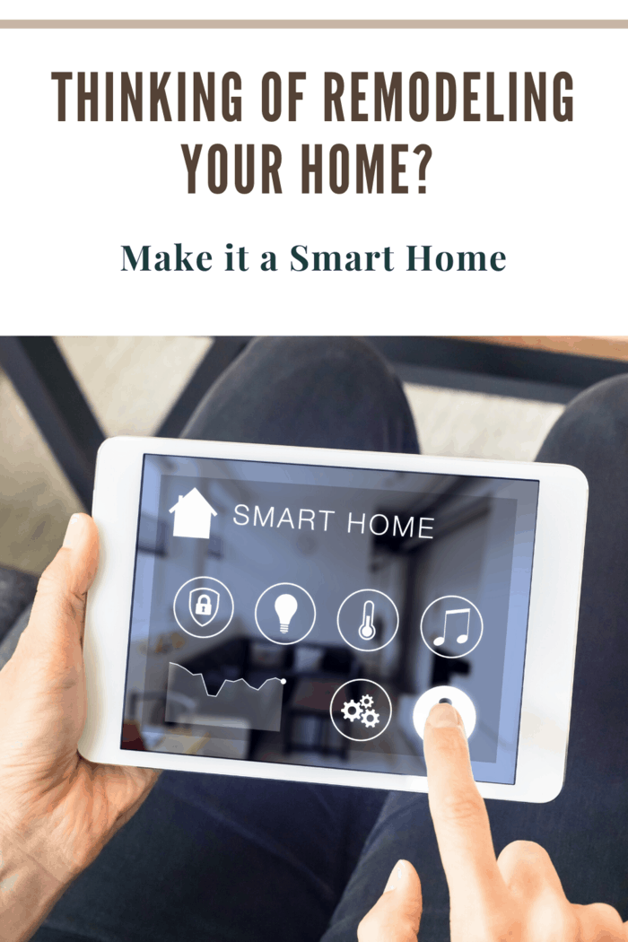 mobile device controling smart home with person pressing smart icon