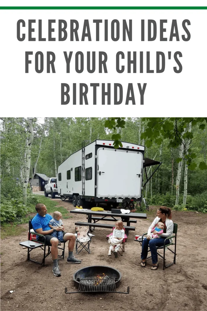 family on camping trip in woods