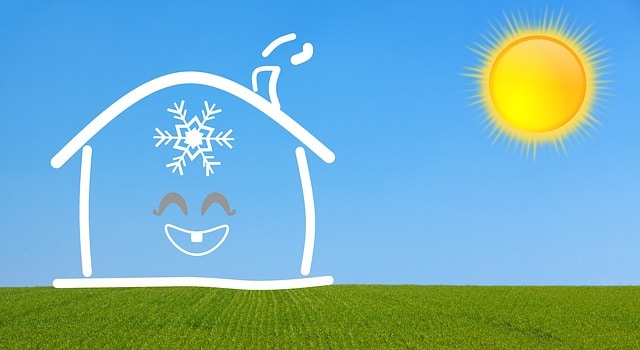 picture of a house with a sun with a blue sky