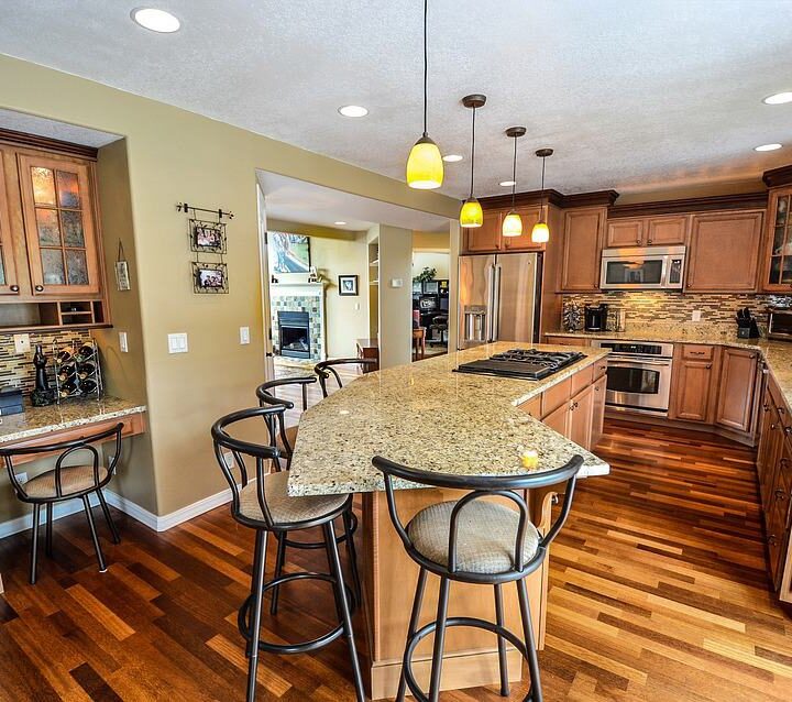 kitchen with hardwood floors and neutral colors