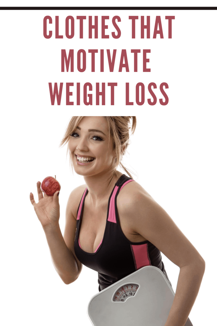 happy fitness woman holding scales in clothes that motivate weightloss