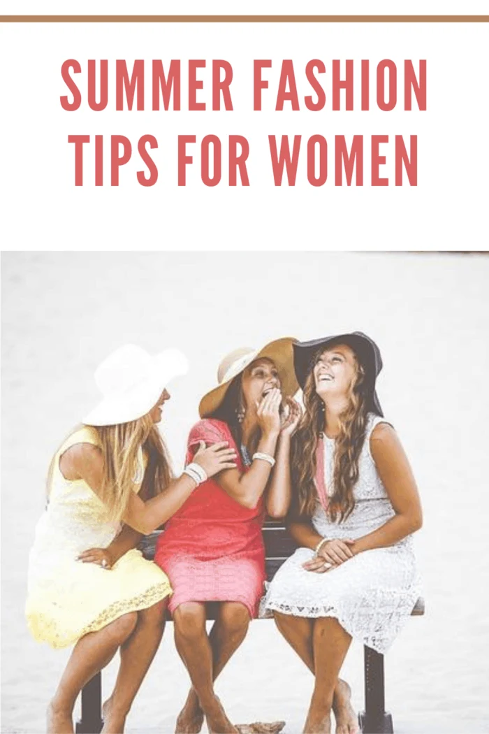 girlfriends with hats, sitting on a bench dressed in summer fashion