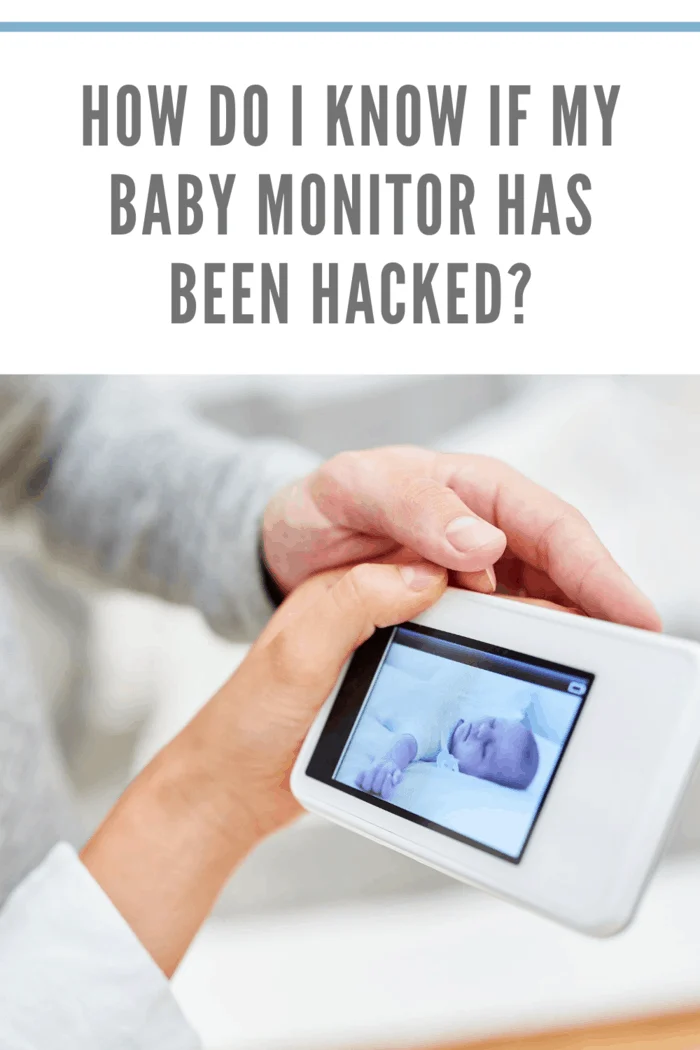 Parents checking baby monitor with camera, observing video feed of their baby for security