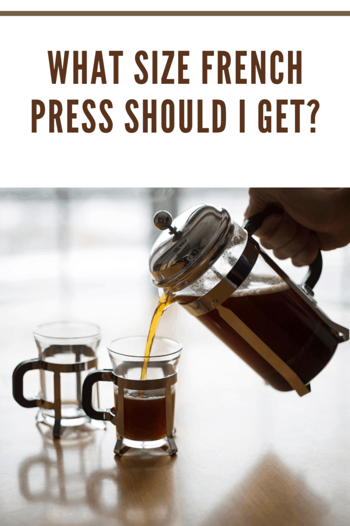 small french press carafe pouring coffee into small glass mugs
